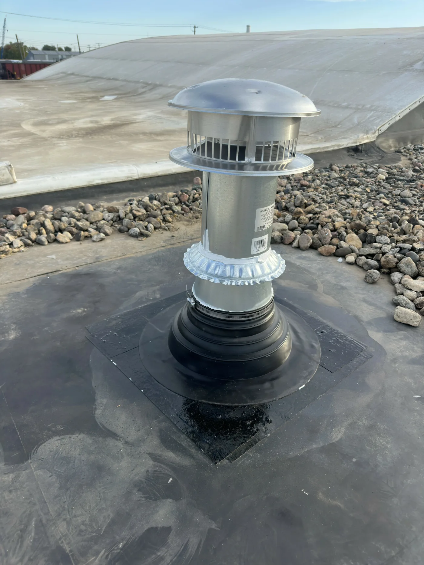 New pipe boot installed on EPDM roof