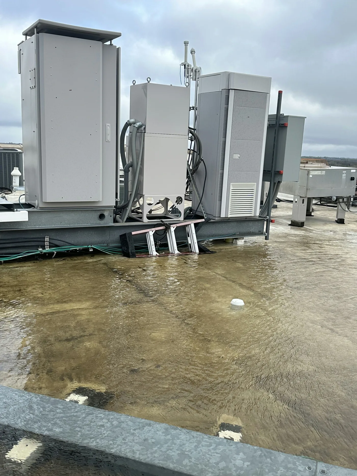 Ponding water due to clogged drain and lack of maintenance
