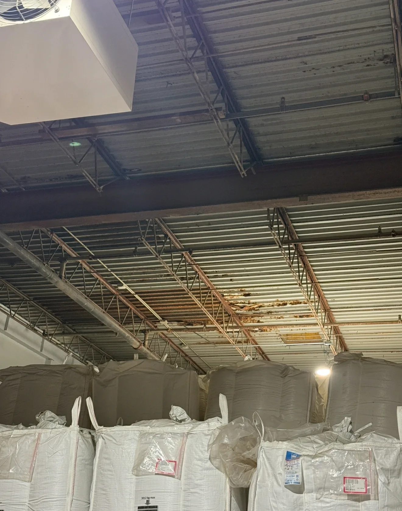 Commercial flat roof restoration on manufacturing facility in Mason City, Iowa